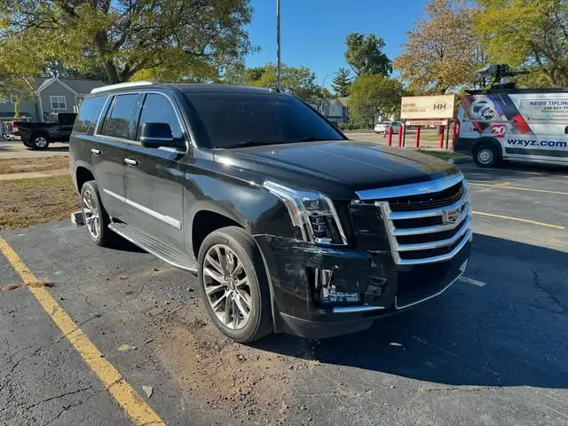 Black Cadillac Escalade at Collision Icon