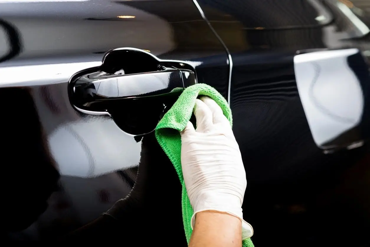 Detailing a glossy black car